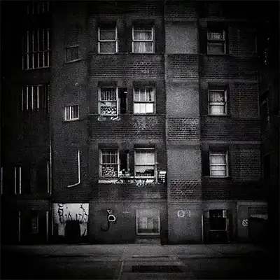 Block of flats in black and grey with low contrast