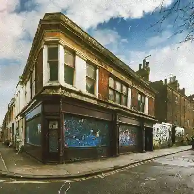 Recursive Records in 2011 before its makeover with grafiti on shop front