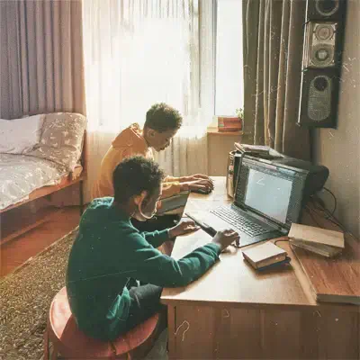 Rico & Dan, in Dan's childhood bedroom on a PC burning music on CD's